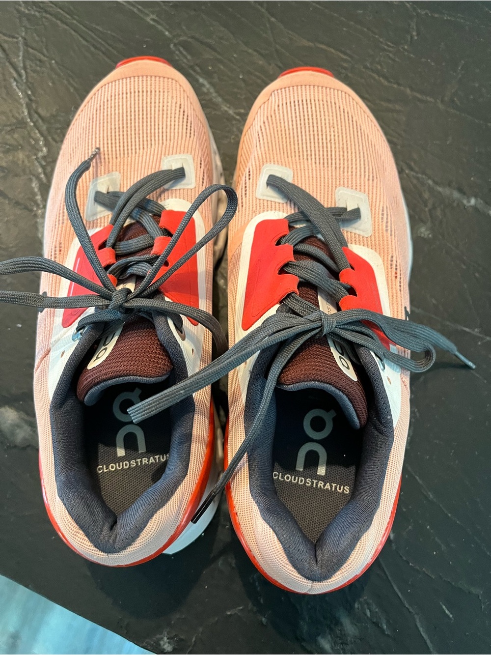 On Running Cloudstratus Running Shoes in Pink with Red Accents
